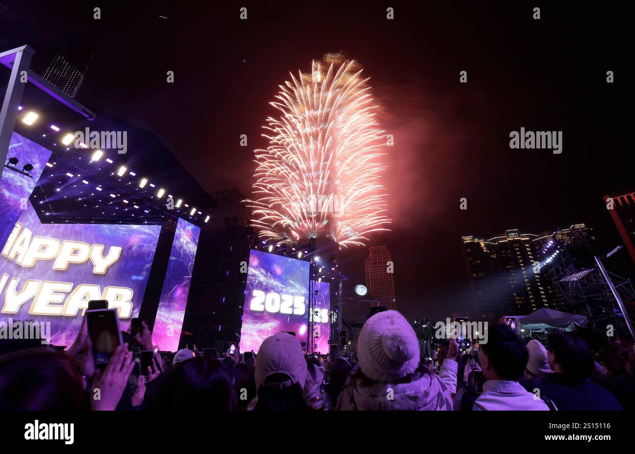 Fireworks explode from the Taipei 101 building during the New Year's