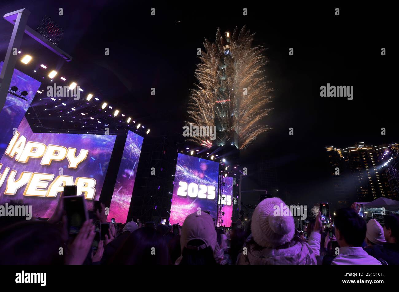 Fireworks explode from the Taipei 101 building during the New Year's