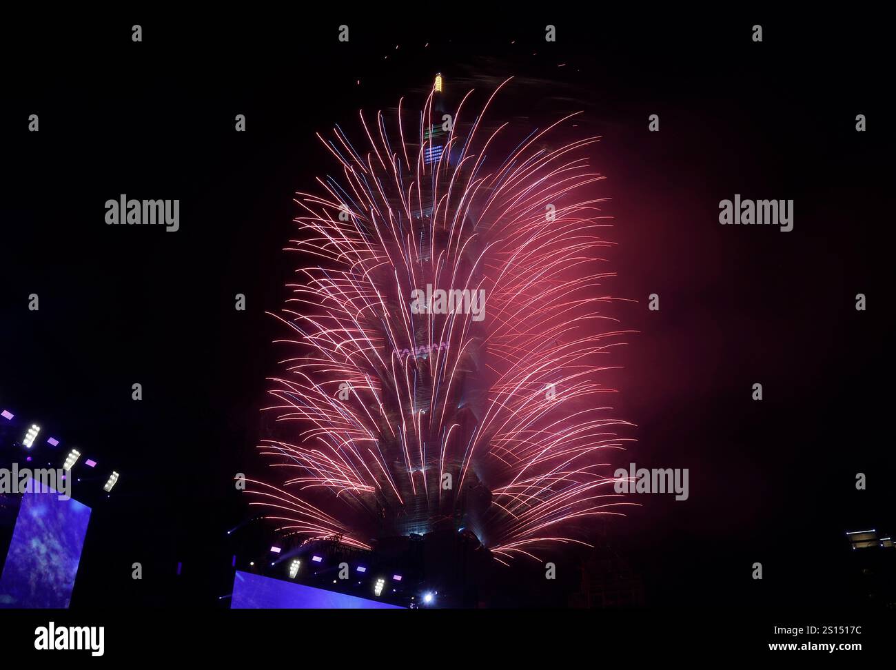 Fireworks explode from the Taipei 101 building during the New Year's