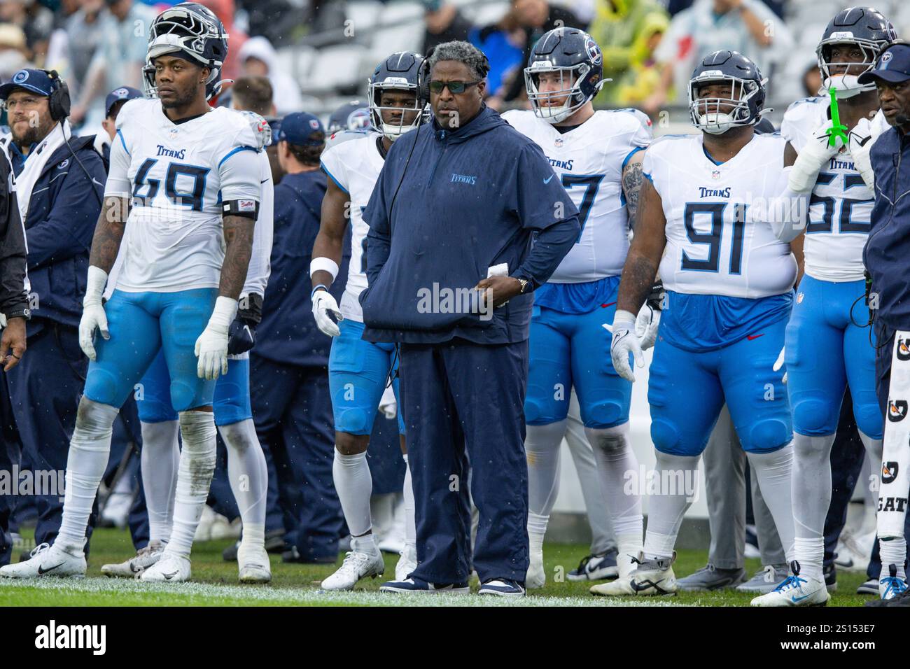 Tennessee Titans defensive line coach Tracy Rocker watches play from ...