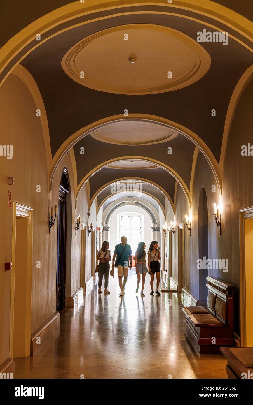 People in corridor, Royal Palace, Godollo, Hungary Stock Photo