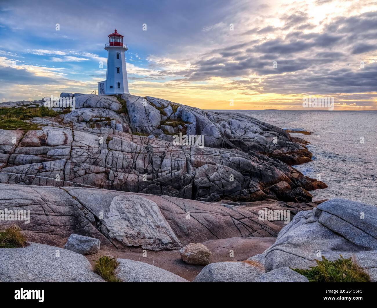 Sunset At Peggys Point Lighthouse Also Known As Peggys Cove Lighthouse Sunset At Peggys Point Lighthouse Also Known As Peggys Cove Lighthouse