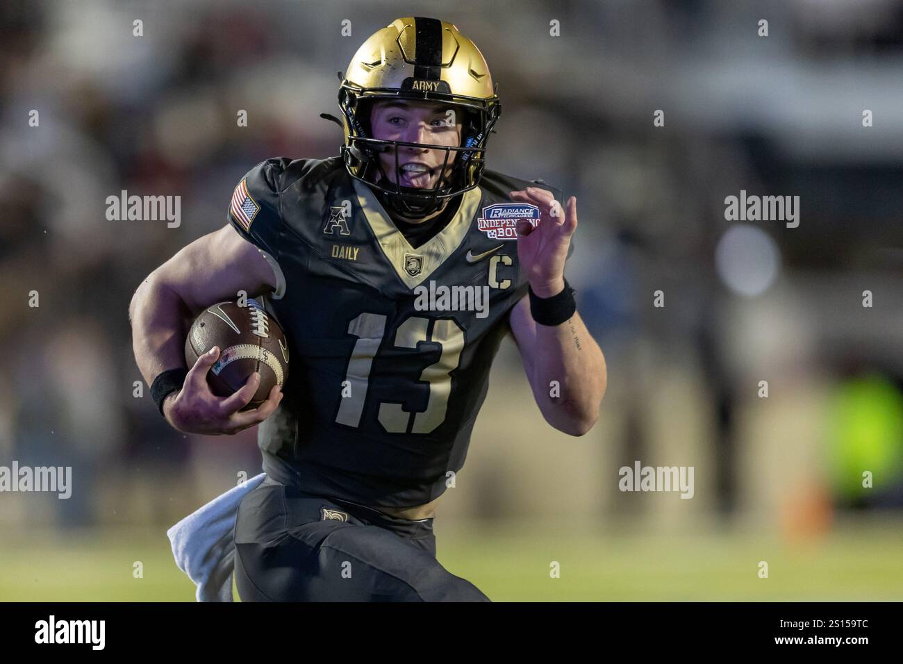 Army Black Knights quarterback Bryson Daily (13) runs toward the ...