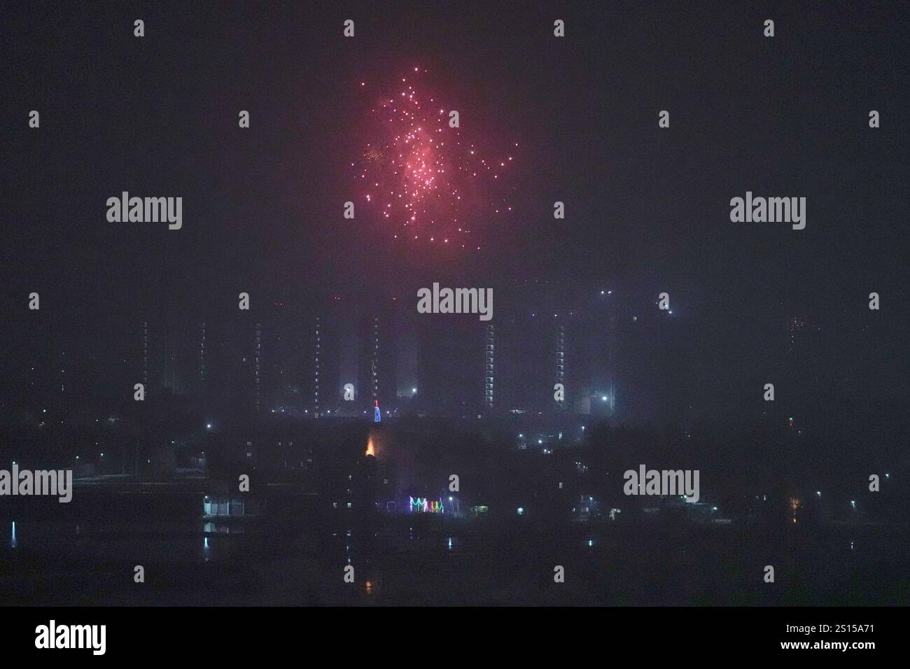 People light fireworks to celebrate the start of New Year 2025 in