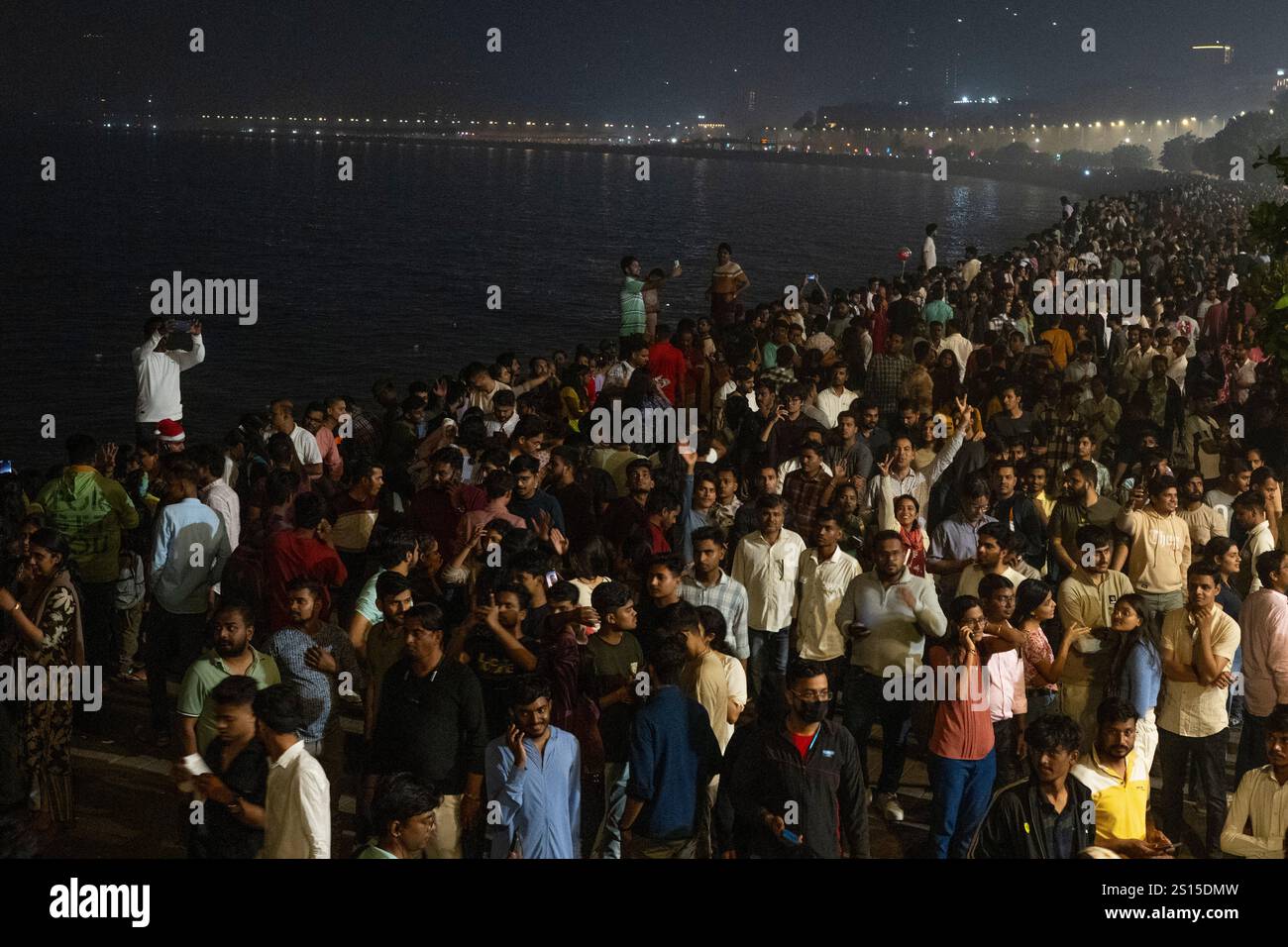 People celebrate the arrival of the New Year at Marine Drive in Mumbai