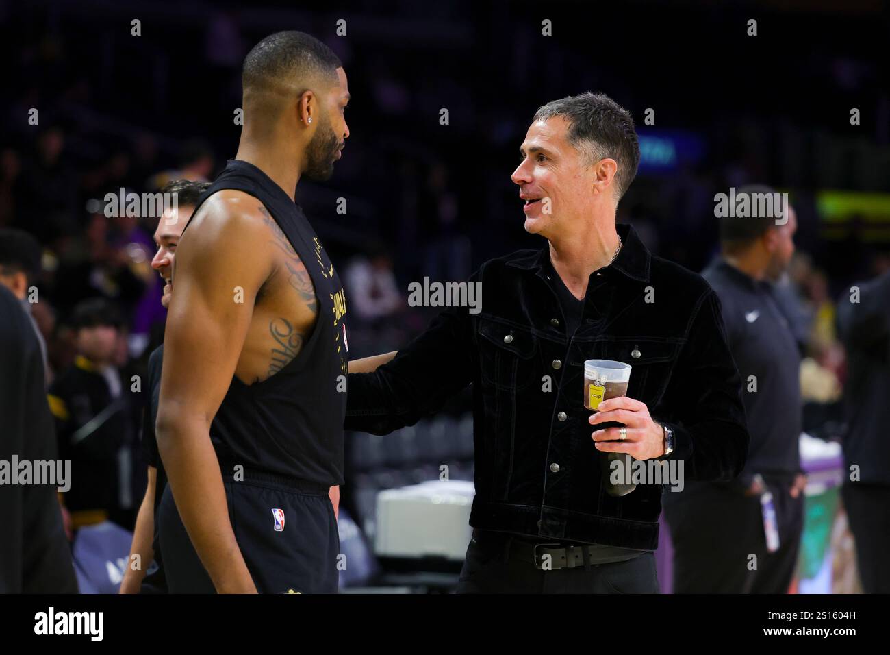 Nba Manager Los Angeles Lakers general manager Rob Pelinka, right, greets Cleveland ...