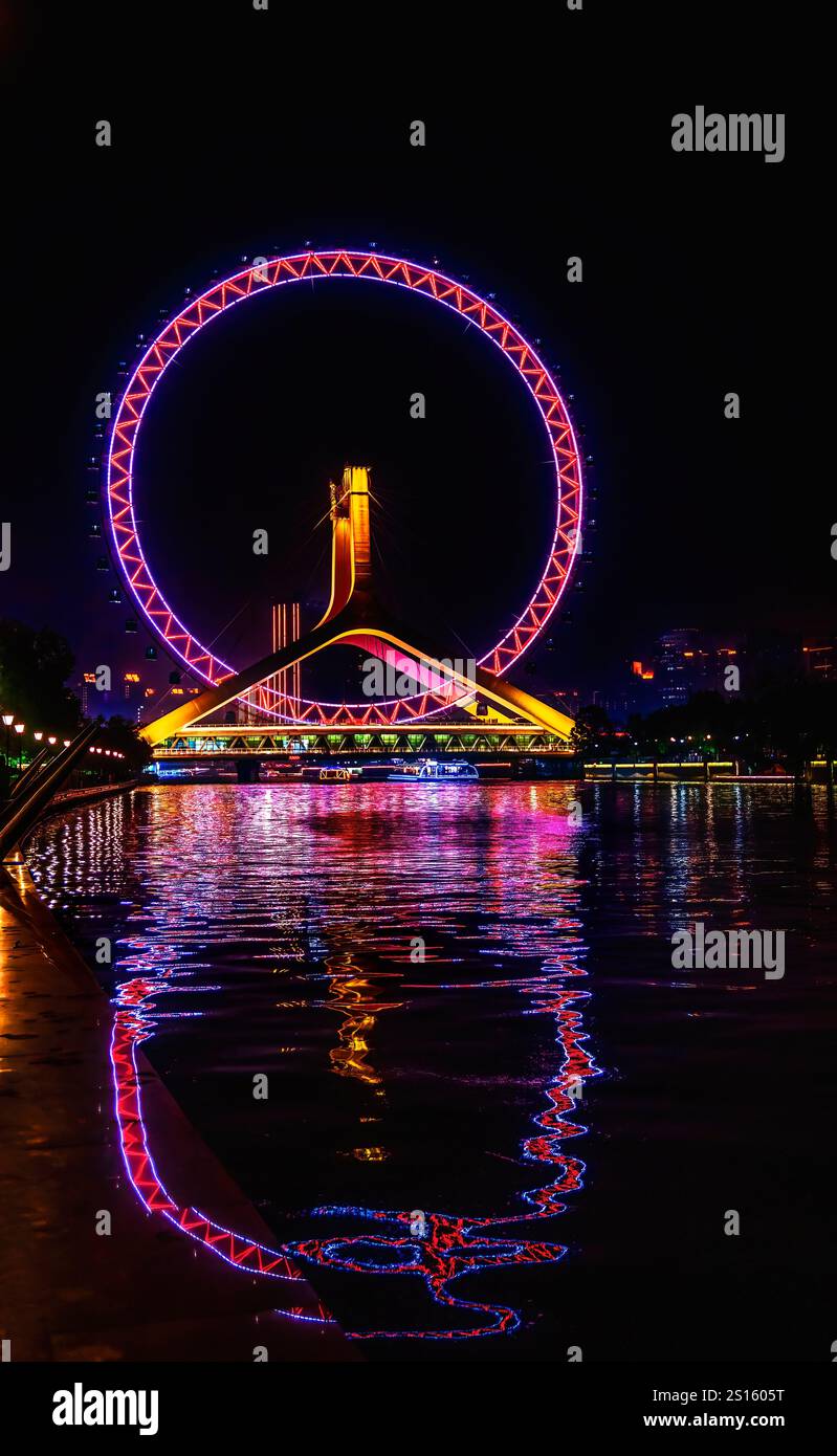 Colorful Large Ferris Wheel Reflection Over Yongle Bridge Hai River Colorful Large Ferris Wheel Reflection Over Yongle Bridge Hai River