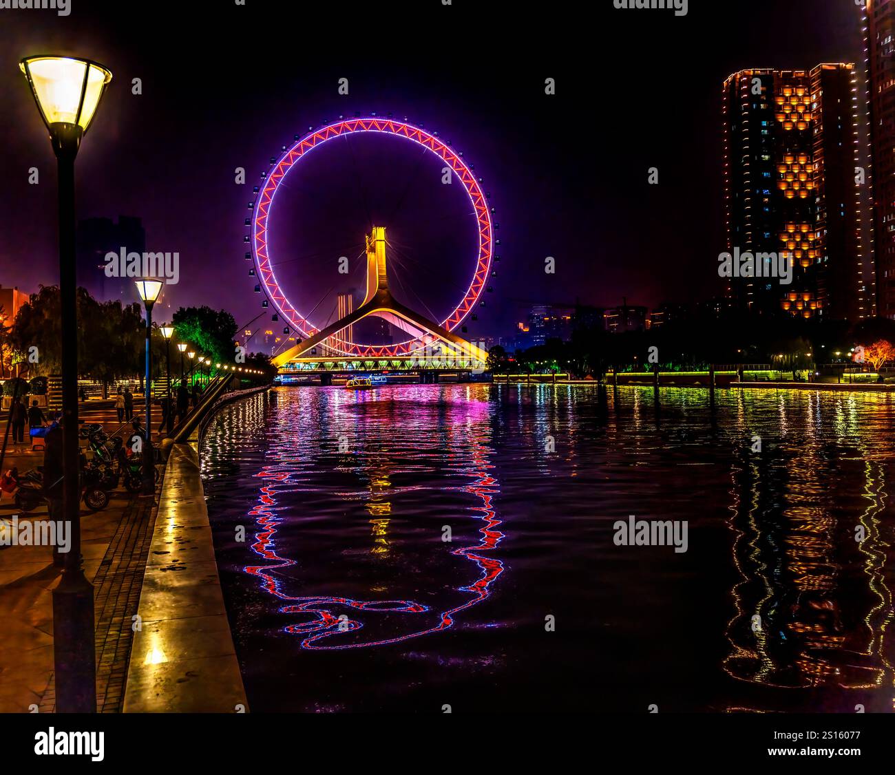 Colorful Large Ferris Wheel Reflection Over Yongle Bridge Hai River Colorful Large Ferris Wheel Reflection Over Yongle Bridge Hai River