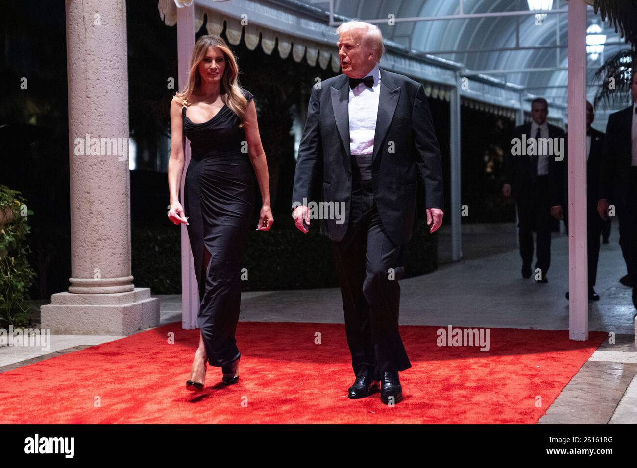 Melania Trump looks on as Presidentelect Donald Trump arrives for a