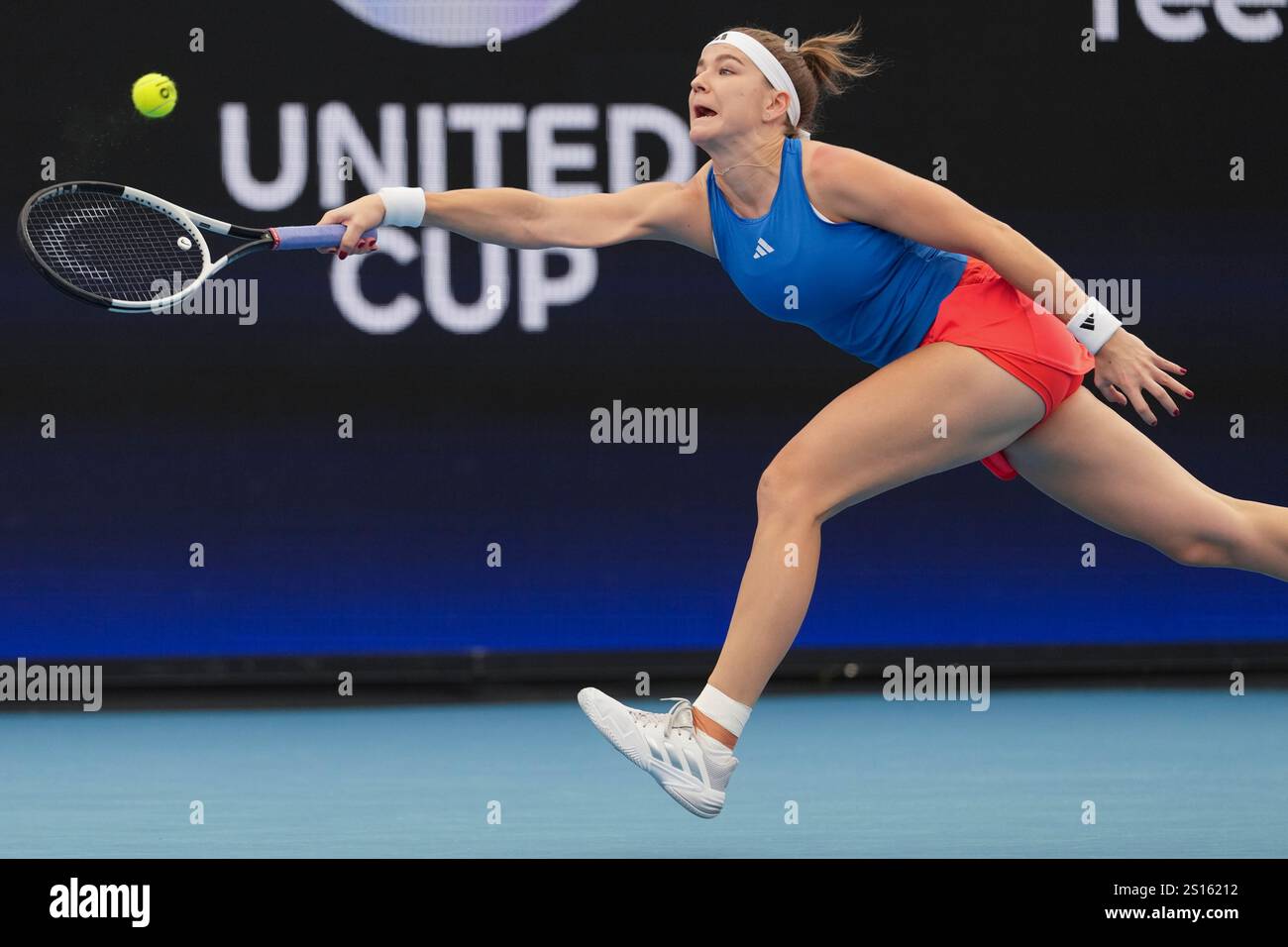 Czech Republic's Karolina Muchova plays a forehand return to Poland's