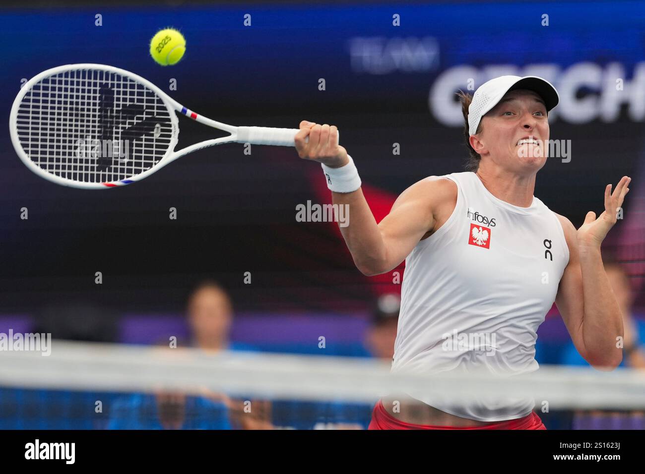 Poland's Iga Swiatek plays a forehand return to Czech Republic's