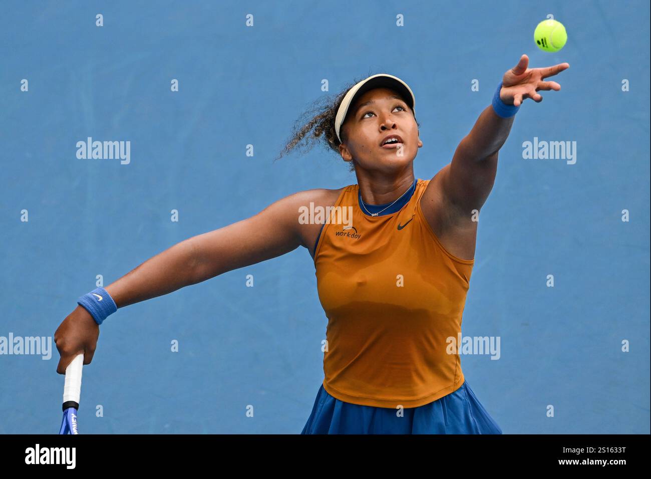Naomi Osaka of Japan serves to to Julia Grabher of Austria in their