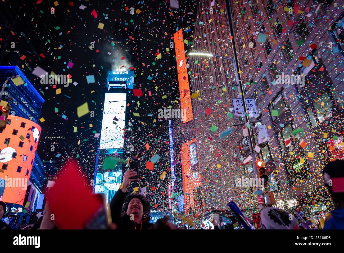 Revelers celebrate after the ball drops in New York's Times Square