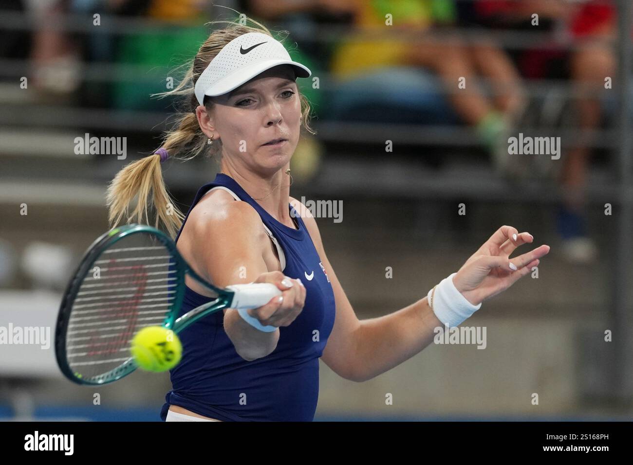 Britain's Katie Boulter plays a forehand return to Australia's Olivia