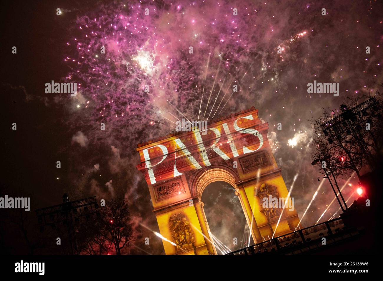 Fireworks and light show on the Arc de Triomphe for the 2025 New Year celebrations on the Champs