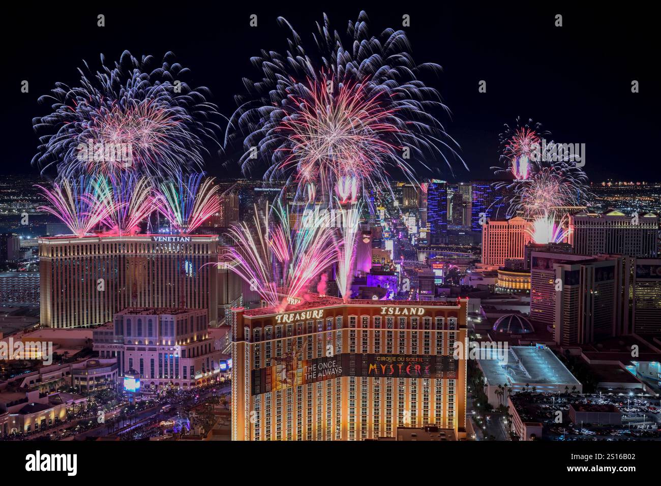 Fireworks explode over the Las Vegas Strip during a New Year's Eve