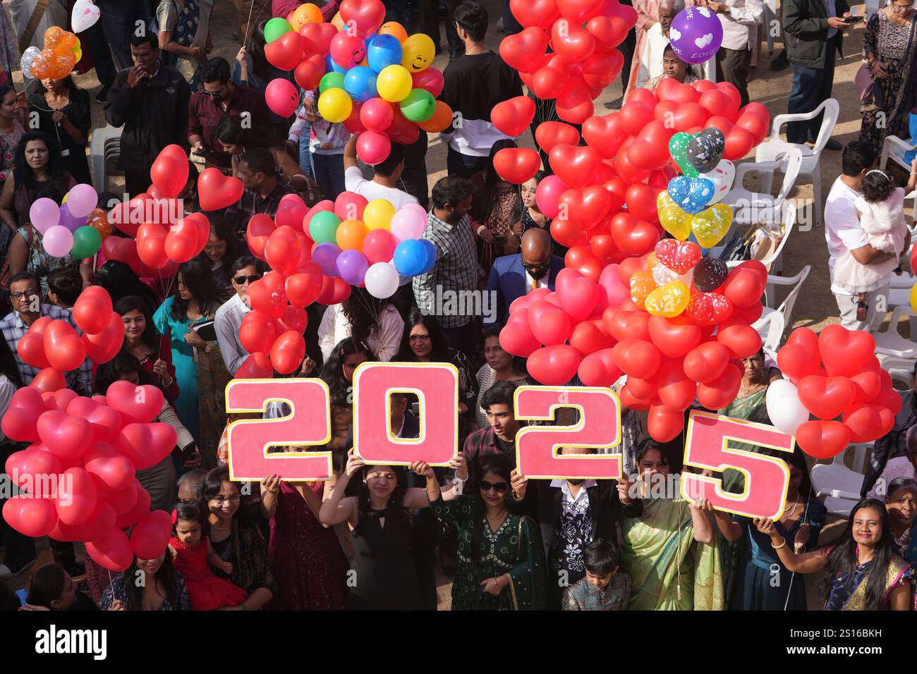 Indian Christians celebrate the New Year after offering prayers at a