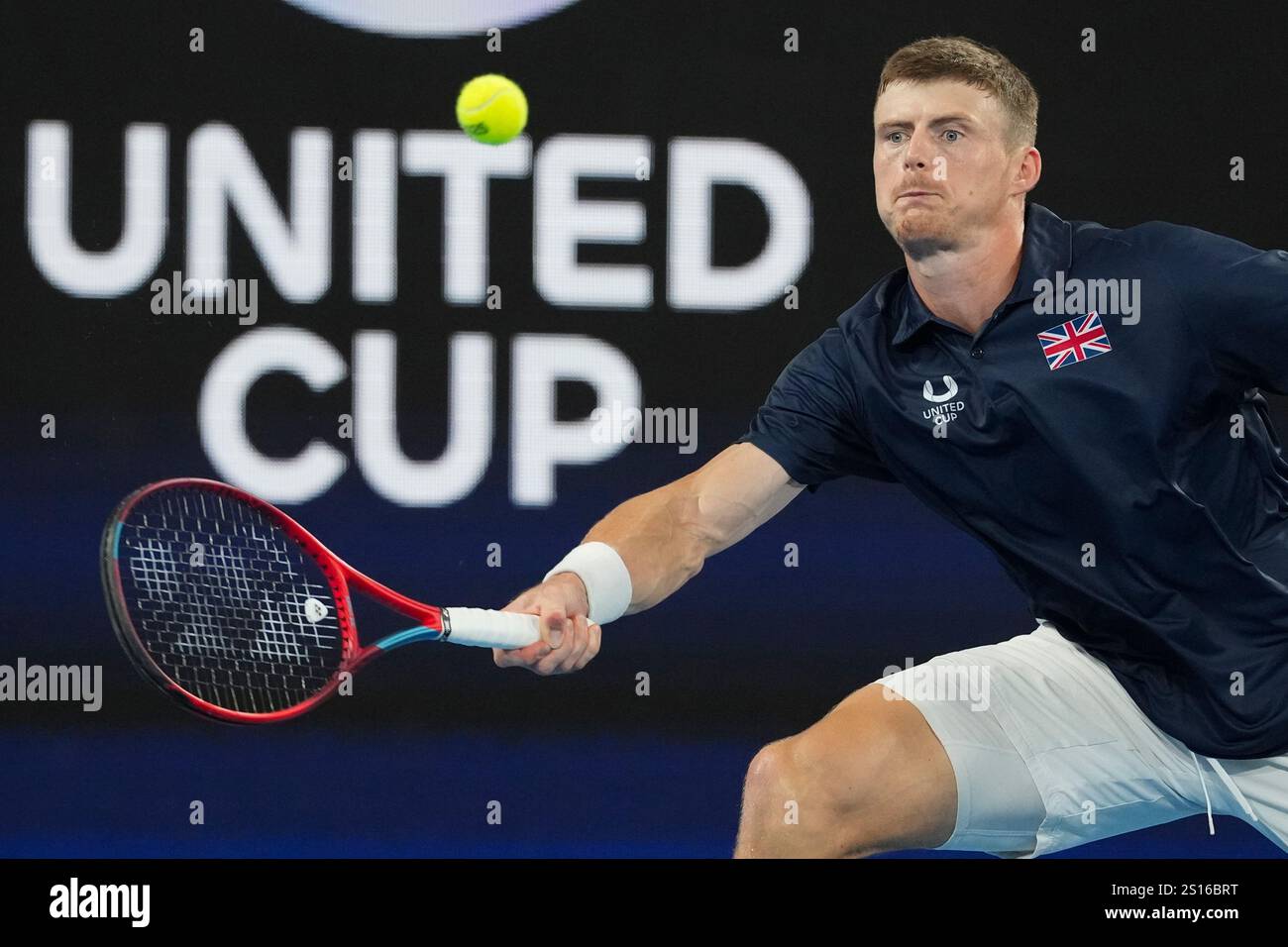 Britain's Billy Harris plays a forehand return to Australia's Alex de