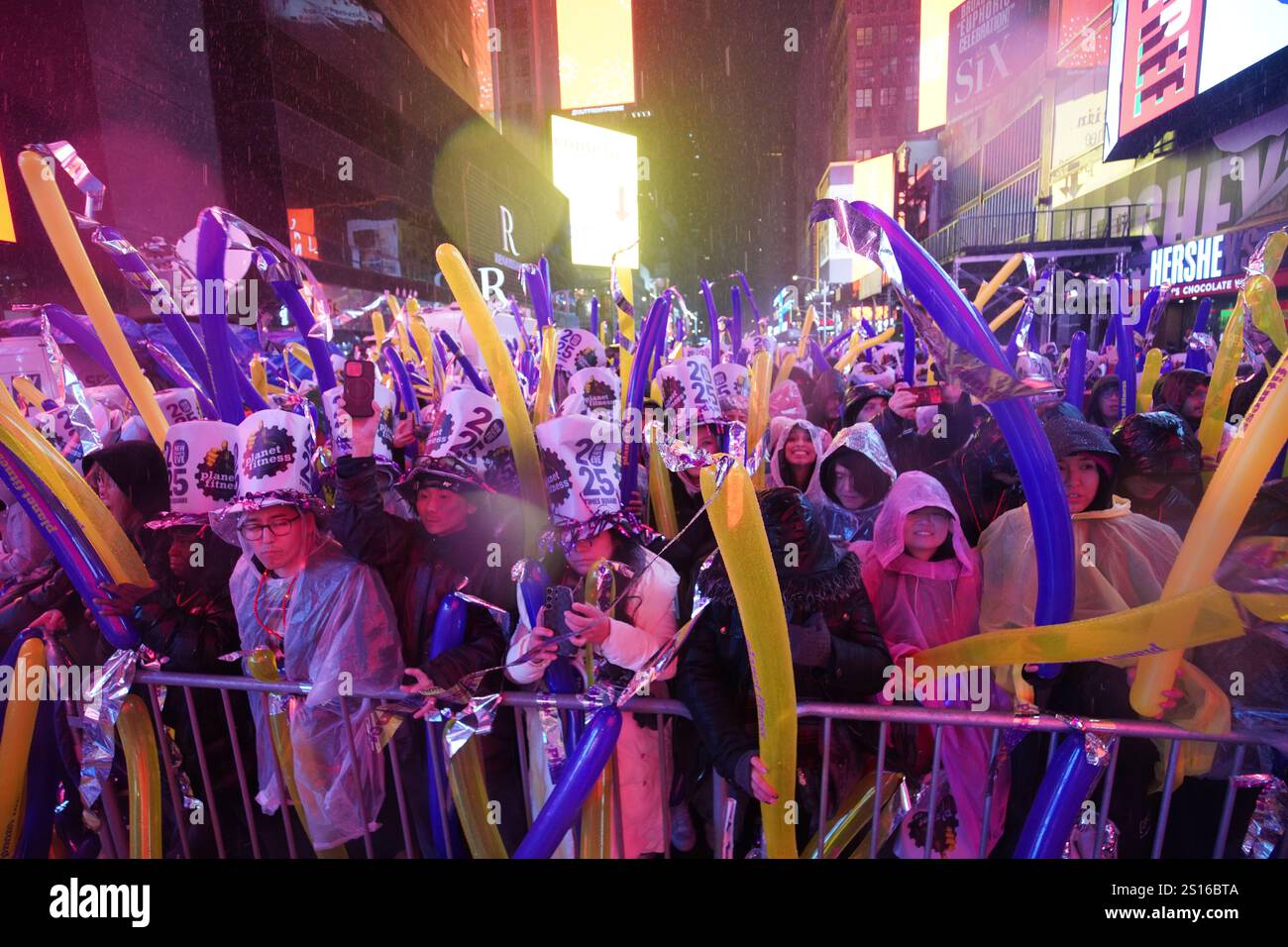 Revelers get their magic balloons during the celebration. The 2025 New ...