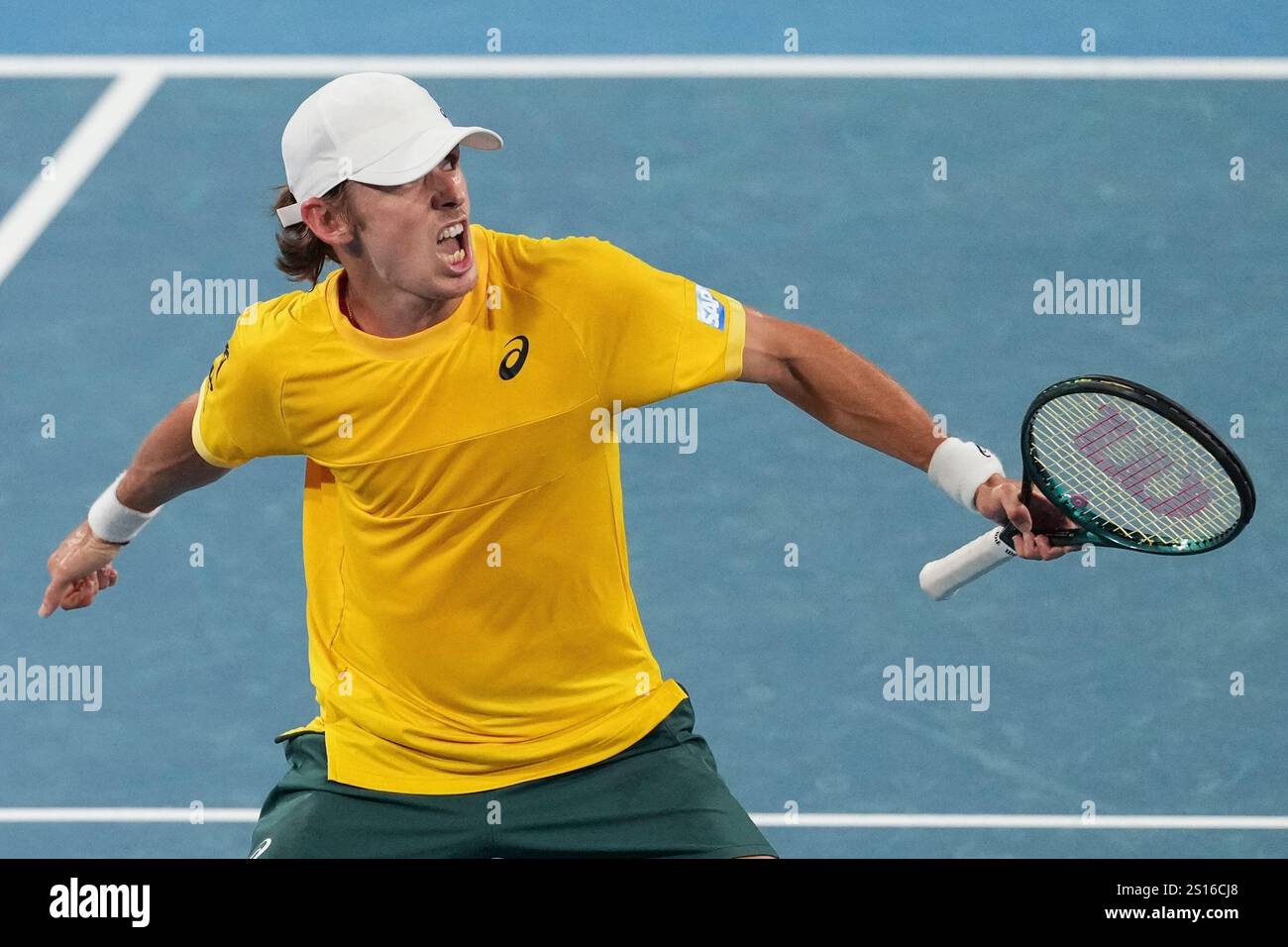 Australia's Alex de Minaur reacts after wimnning a point against