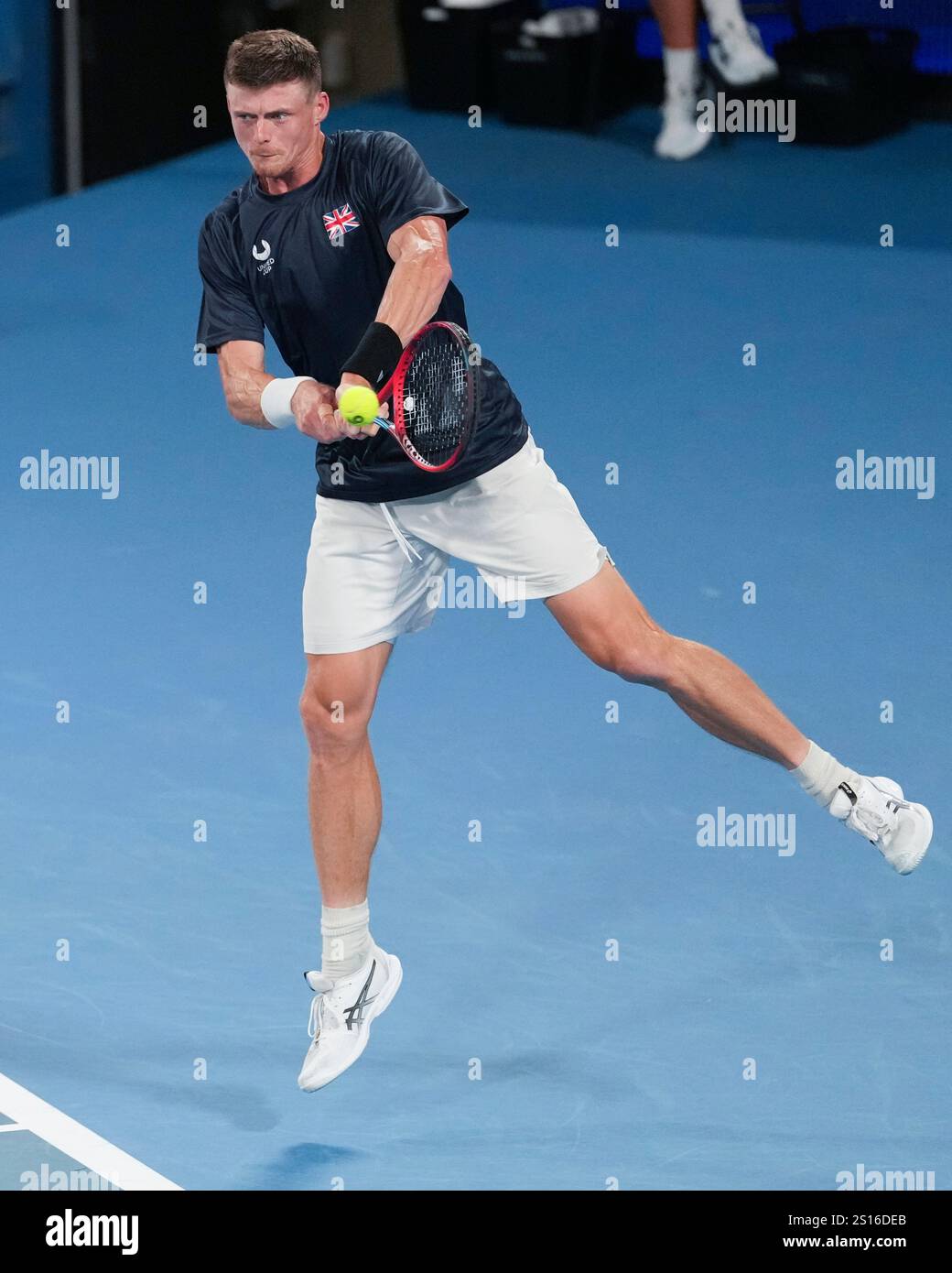 Britain's Billy Harris plays a backhand return to Australia's Alex de