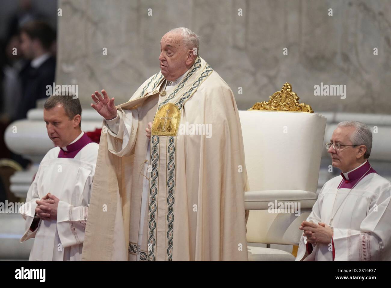 Pope Francis is flanked by Vatican Head Master of Ceremonies, Bishop ...