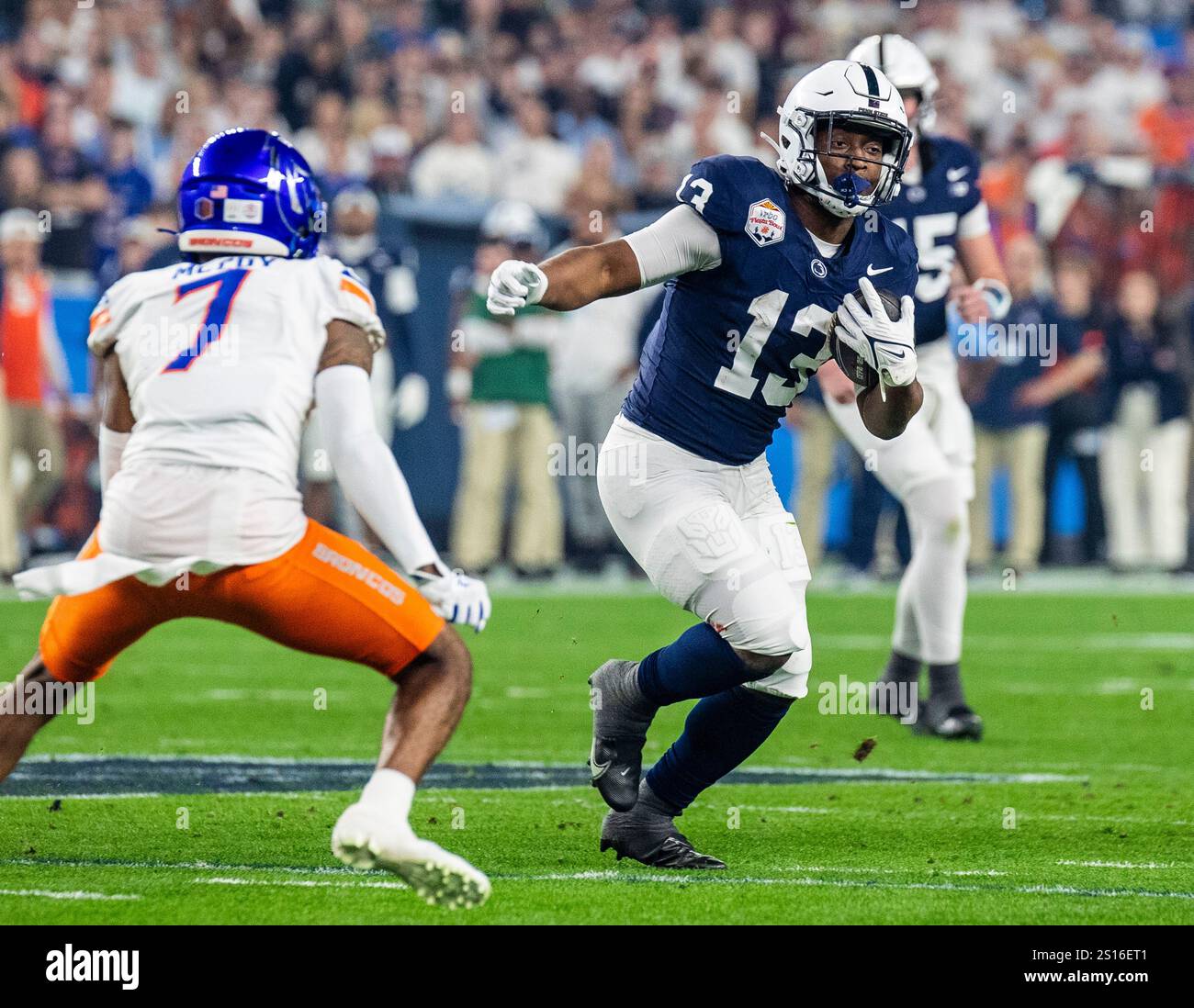 Glendale, Arizona, USA. December 31 2024 Glendale, AZ U.S.A. Penn State running back Kaytron Allen (13) runs to the outside for a first down during the NCAA Vrbo Fiesta Bowl Playoff Quarterfinal football game between Penn State Nittany Lions and the Boise State Broncos. Penn State beat Boise State 31-14 at State Farm Stadium Glendale, AZ Thurman James/CSM Credit: Cal Sport Media/Alamy Live News Stock Photo