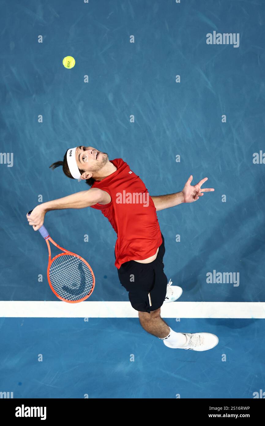 Taylor Fritz of the United States serves to Zhizhen Zhang of China