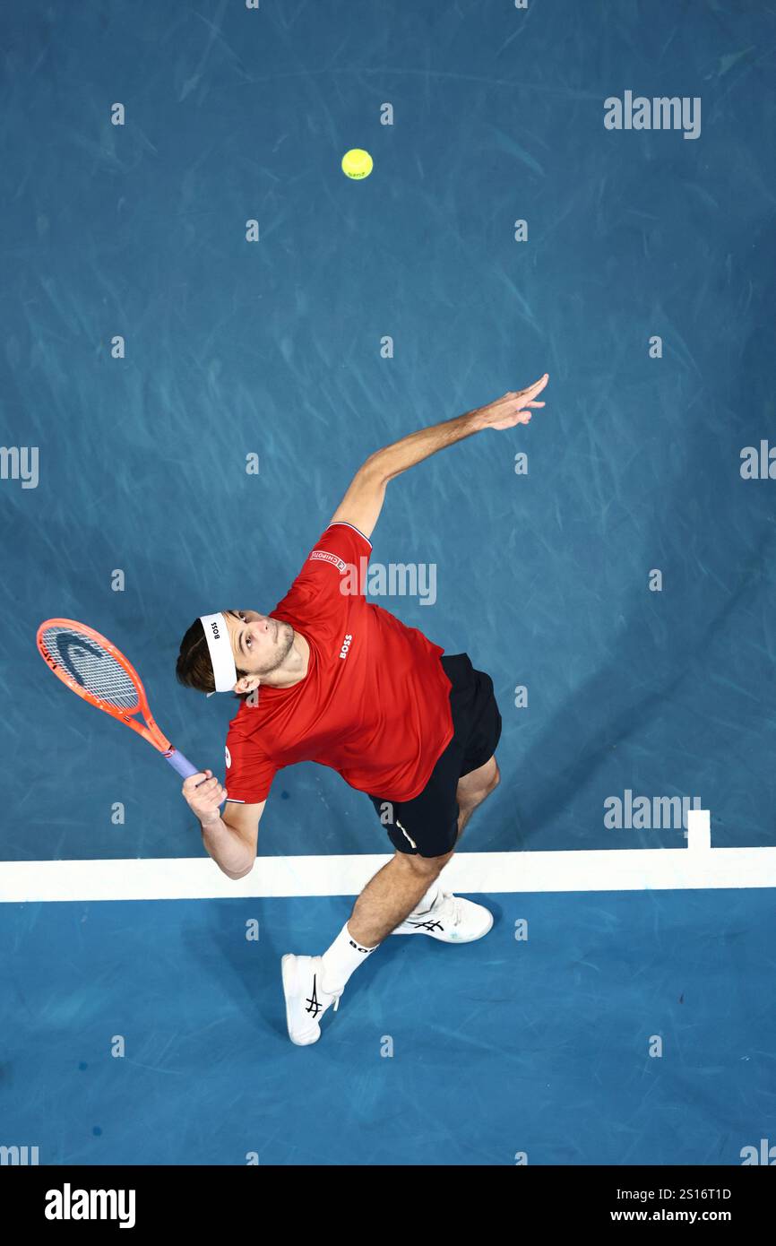Taylor Fritz of the United States serves to Zhizhen Zhang of China
