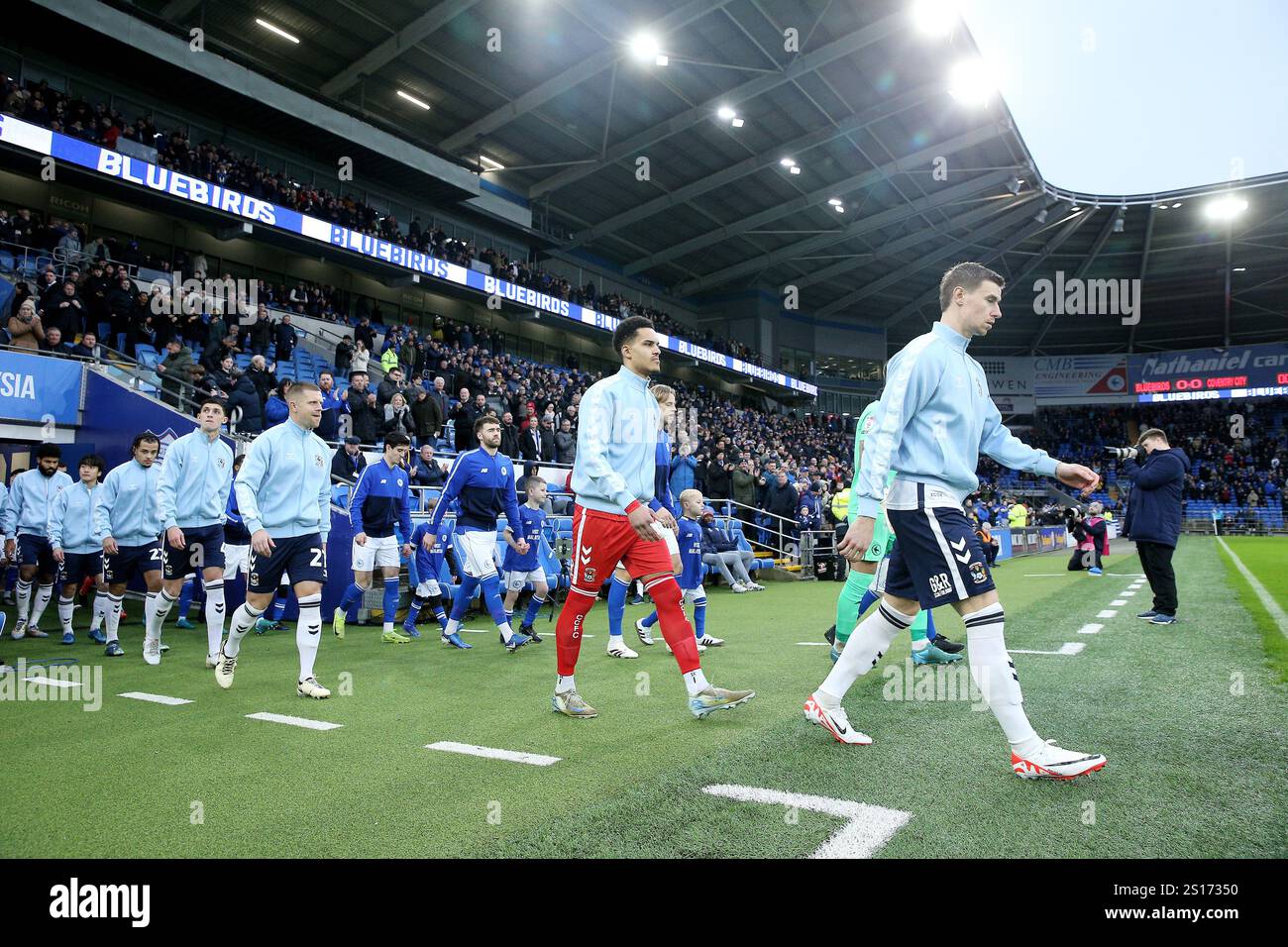 Players from both sides enter the pitch ahead of the Sky Bet