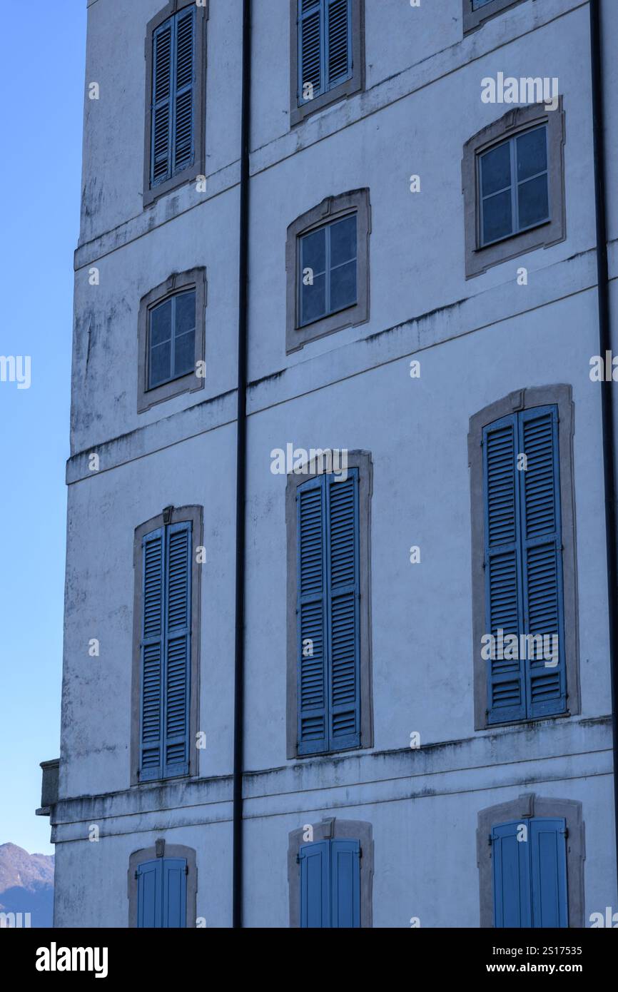 Blue window shutters in Italy Stock Photo