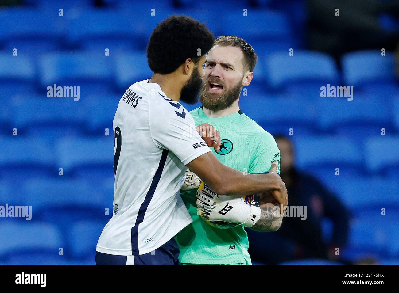 Tempers flare between Coventry City's Ellis Simms (left) and Cardiff ...