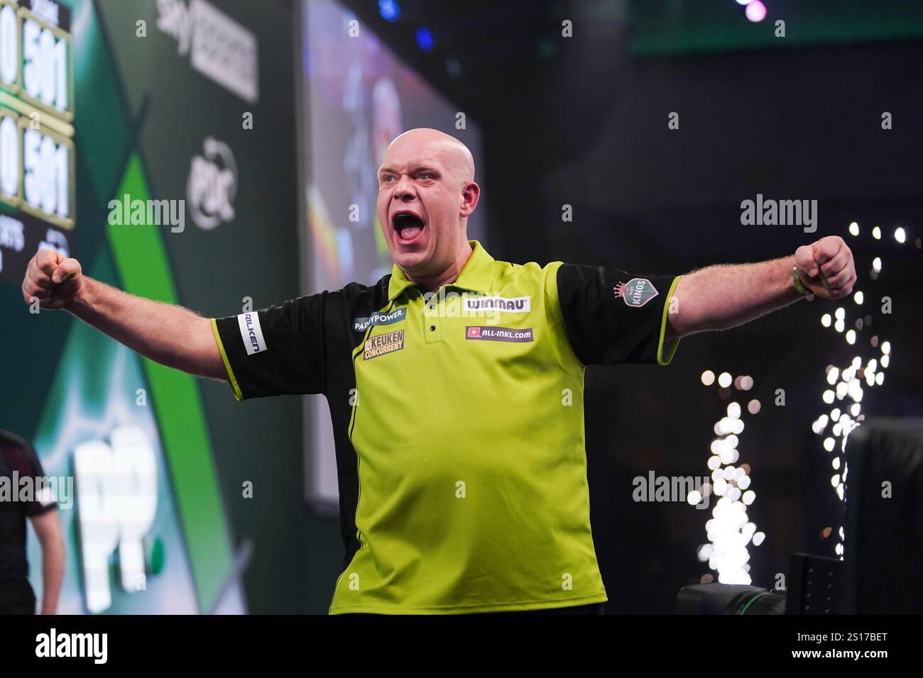 Michael Van Gerwen of the Netherlands celebrates after winning his