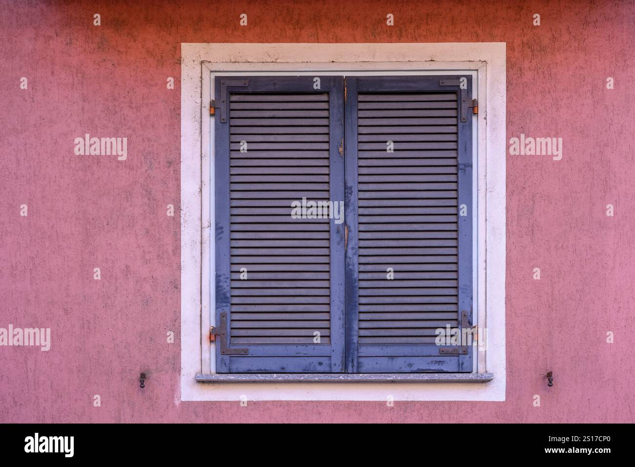 Wooden facade with blue window hi-res stock photography and images - Alamy