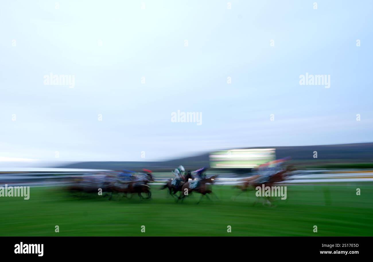 Runners and riders in action during the Raceridecheltenham "Junior