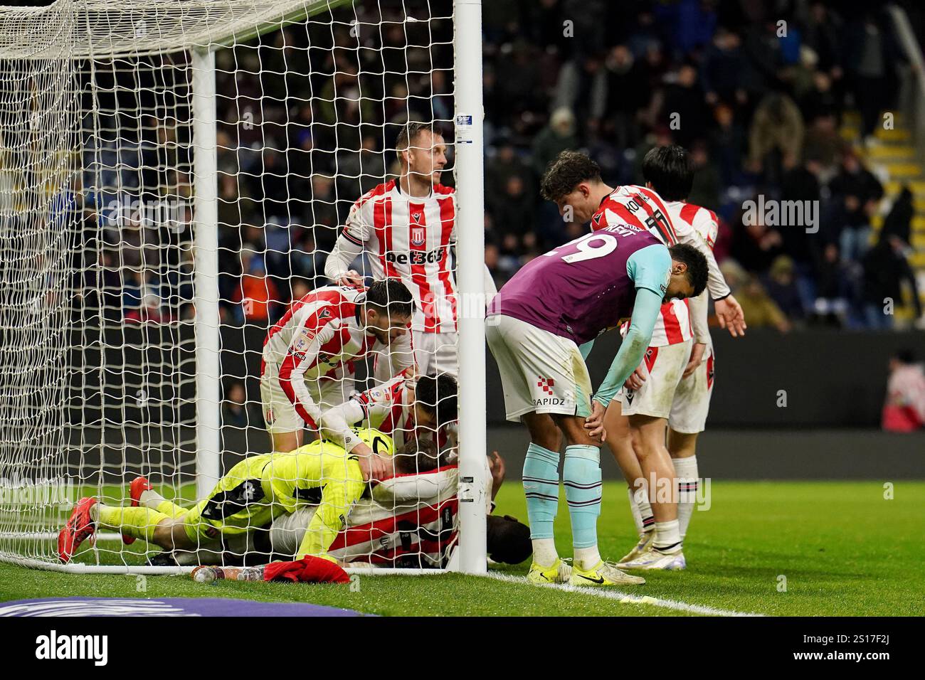 Burnley's Josh Laurent (centre right) reacts during the Sky Bet