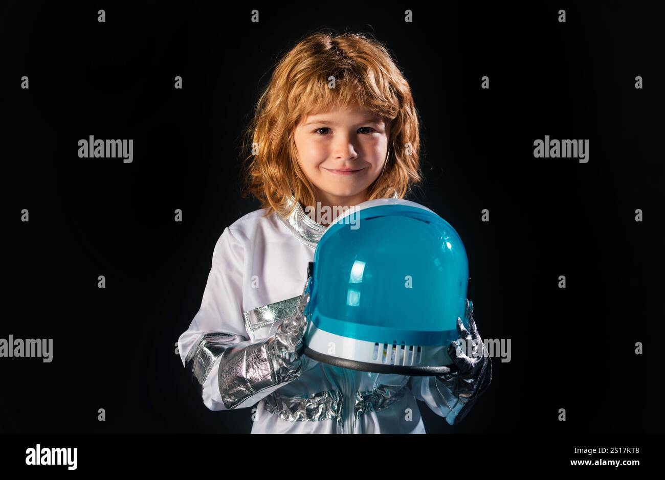 Kid boy exploring space. Portrait of cute kids in space suits ...