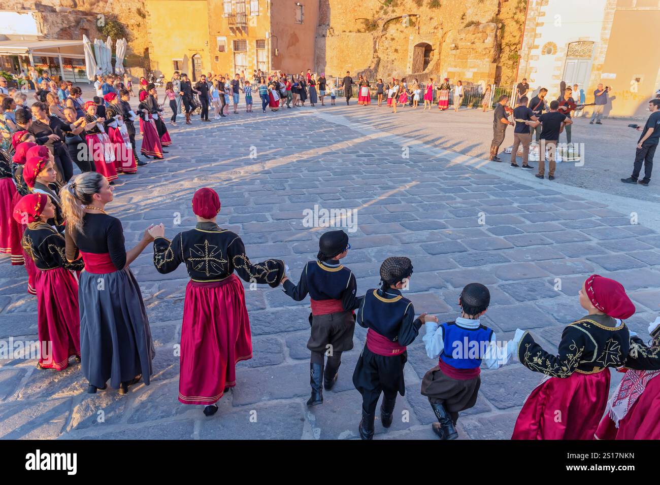 Group of people performing traditional Greek dance, Chania, Crete, Greek Islands, Greece Stock Photo