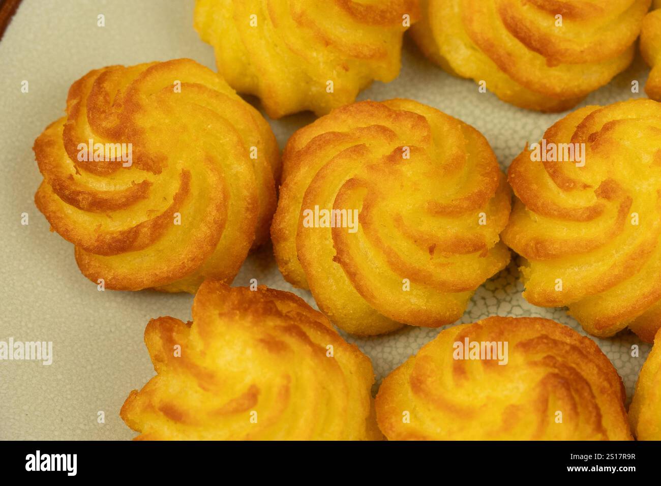 duchess potatoes on a plate Stock Photo