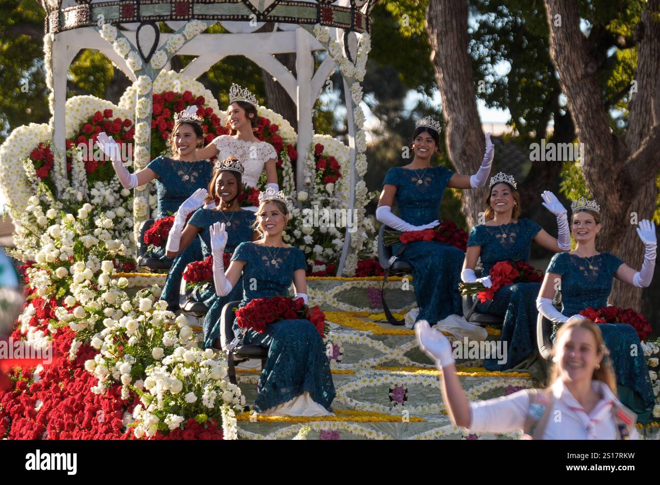 The 2025 Tournament of Roses Rose Court waves to spectators at the