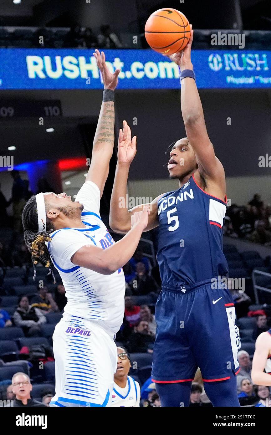 UConn center Tarris Reed Jr., right, shoots over DePaul forward NJ ...