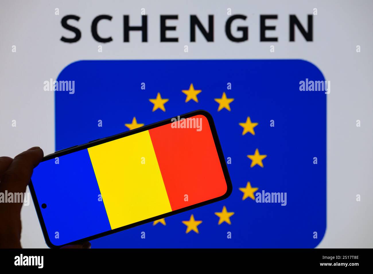 The Romania flag is displayed on a mobile device with the European