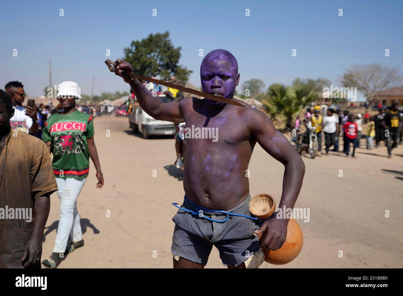 A man from the Berom tribe holds a knife during the annual New Year