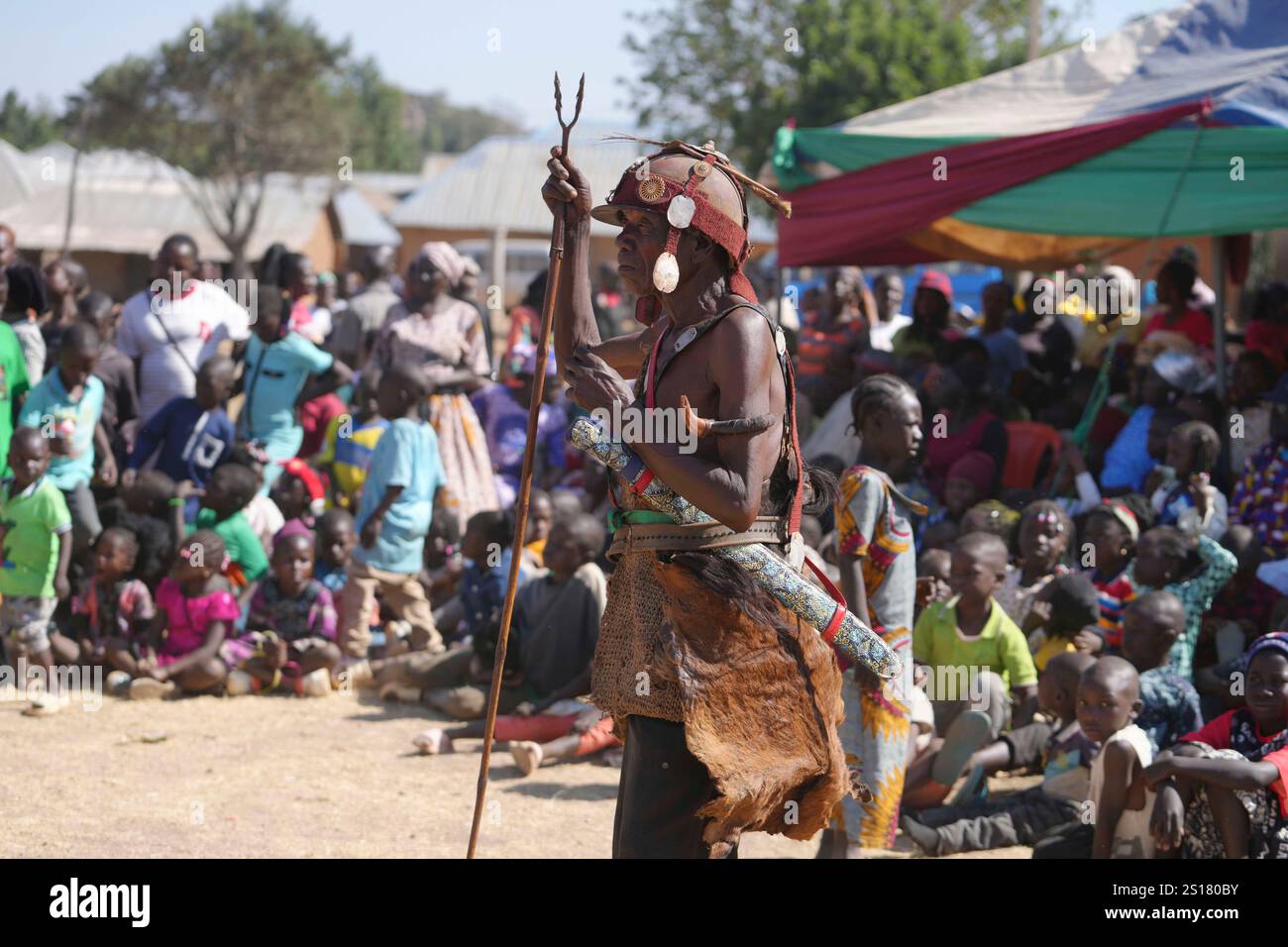A Berom man in traditional clothing attends the annual New Year