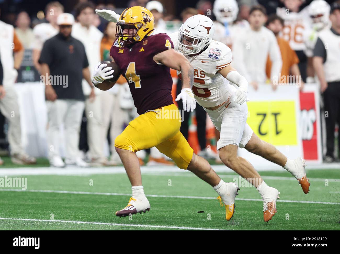 Arizona State running back Cam Skattebo (4) rushes against Texas in the