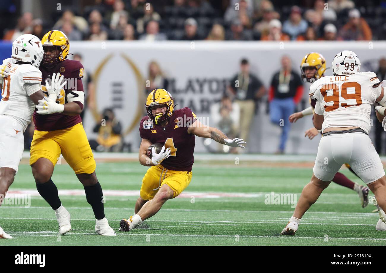 Arizona State running back Cam Skattebo (4) rushes against Texas in the
