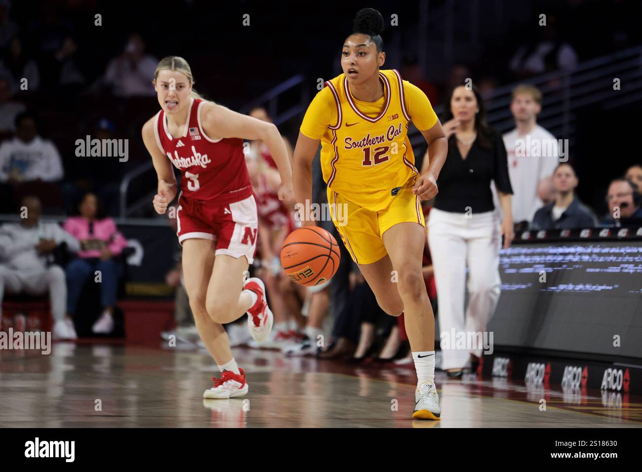 Southern California guard JuJu Watkins (12) dribbles down the court as