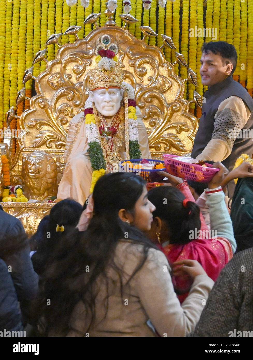 NEW DELHI, INDIA JANUARY 1 Devotees visit Sai Temple to offer