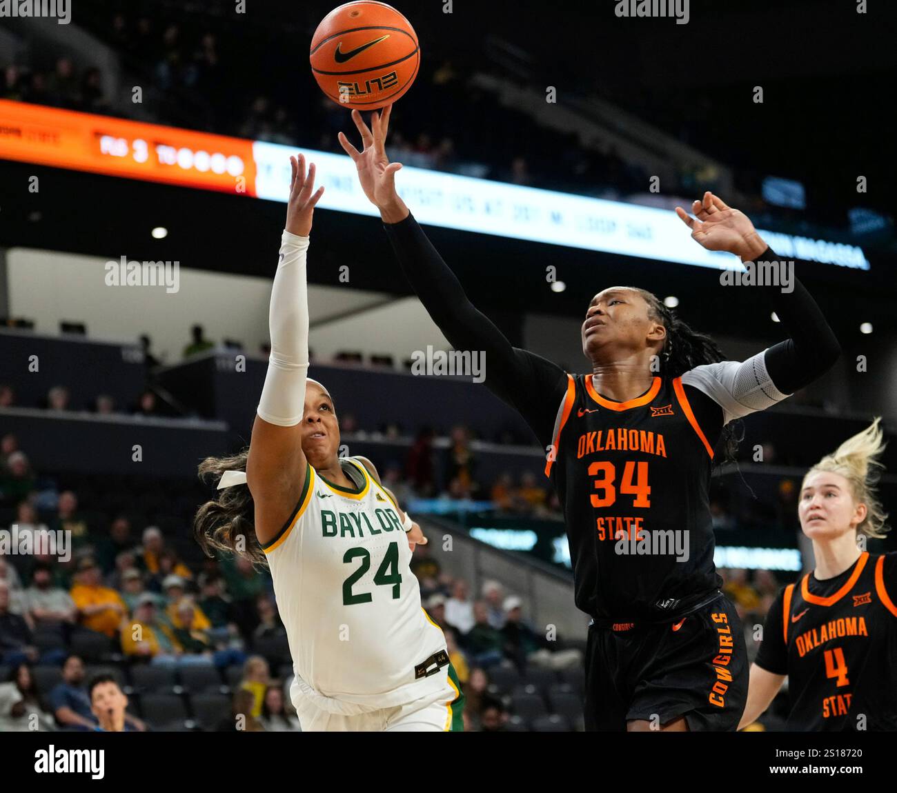 Oklahoma State center Tenin Magassa blocks the shot of Baylor guard