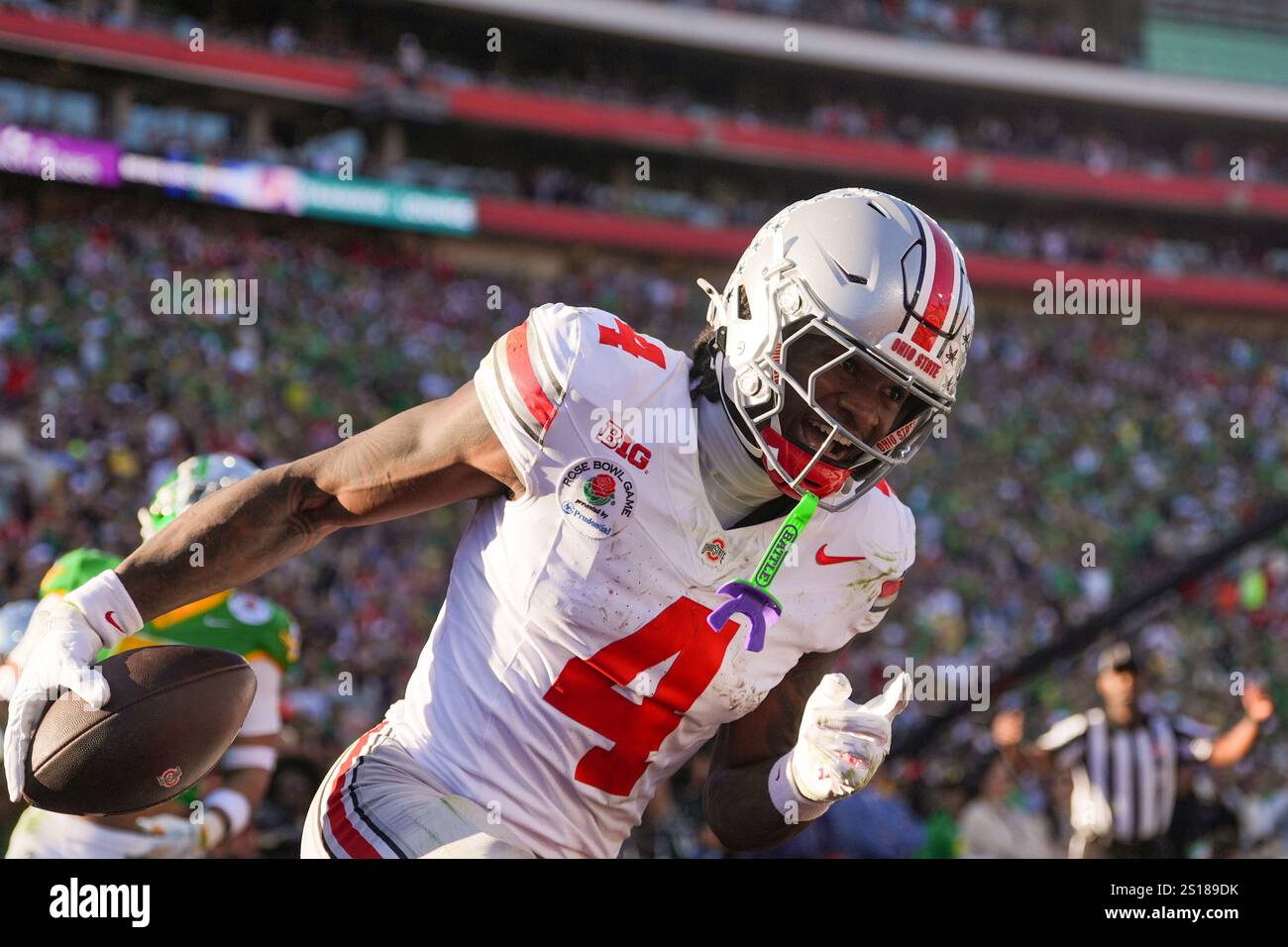 Ohio State wide receiver Jeremiah Smith (4) celebrates his touchdown